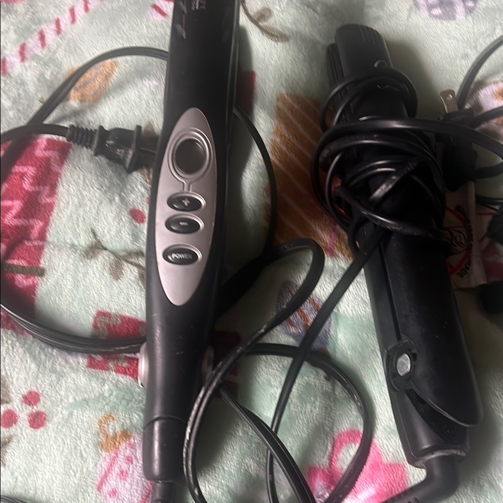 (2) Black Hair Straighteners one Wet2straight and the other Sultra slim,